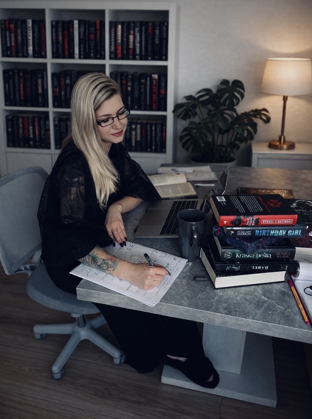 Marianna working at her desk — The White Rose Raven